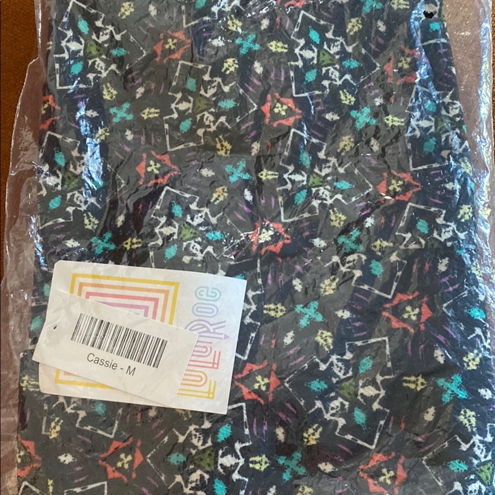 LuLaRoe Cassie Skirt with Colorful Starburst Pattern